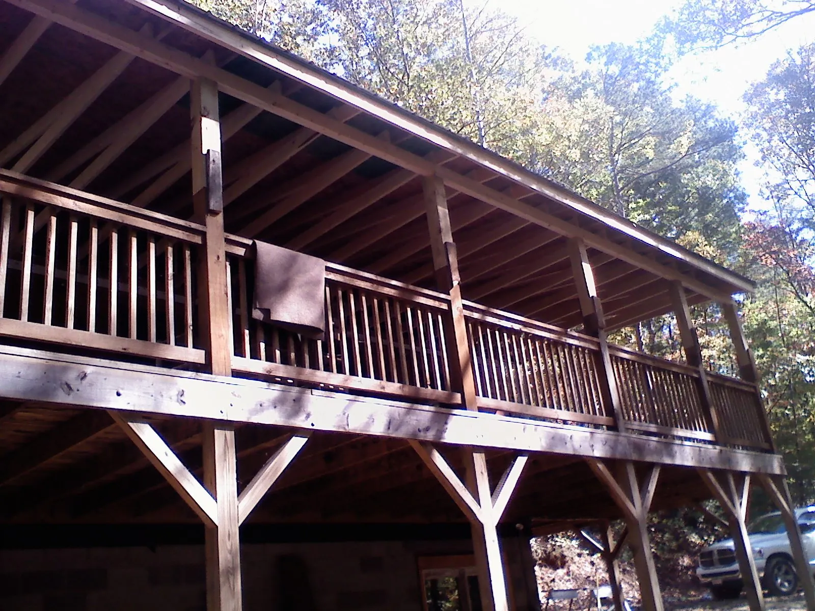 Timber framing under a new elevated porch and deck — Roof Leak Repair in Putnam by Roofing Brothers
